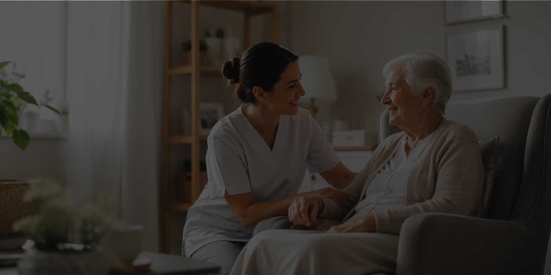 A caregiver assisting an elderly client in a home care setting